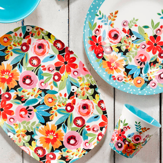 floral designed plates and glass