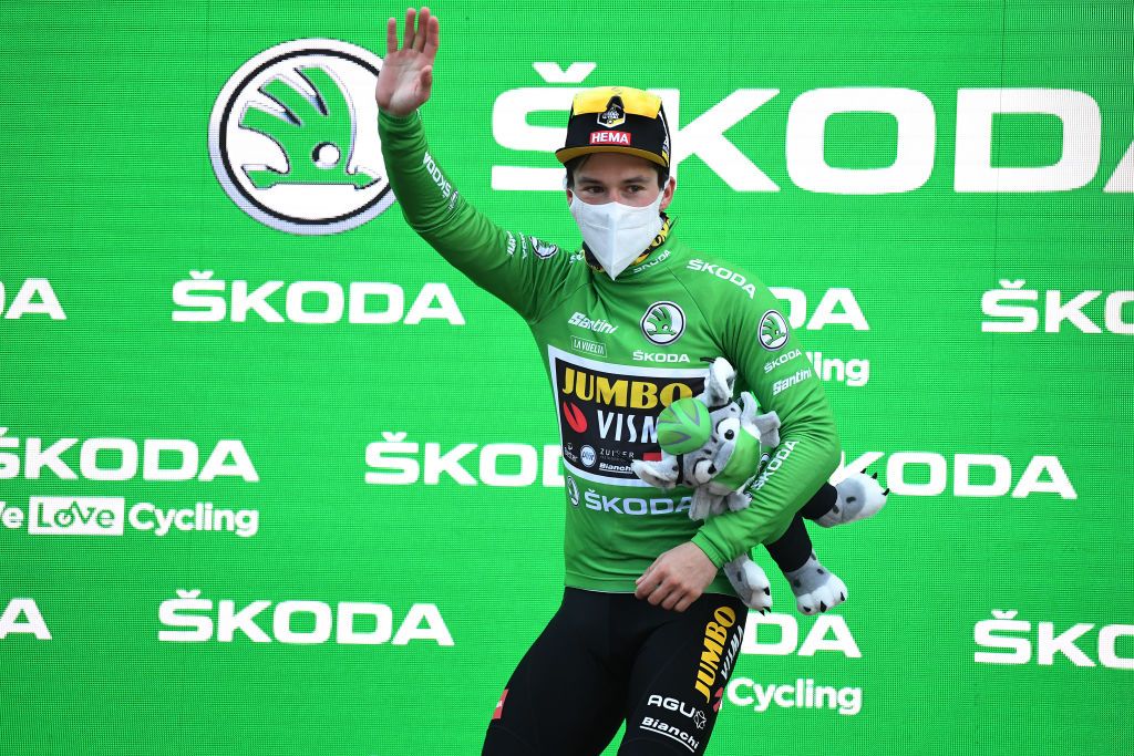 VILLANUEVA DE VALDEGOVIA SPAIN OCTOBER 27 Podium Primoz Roglic of Slovenia and Team Jumbo Visma Green Points Jersey Celebration Mascot during the 75th Tour of Spain 2020 Stage 7 a 1597km from VitoriaGasteiz to Villanueva de Valdegovia lavuelta LaVuelta20 La Vuelta on October 27 2020 in Villanueva de Valdegovia Spain Photo by David RamosGetty Images