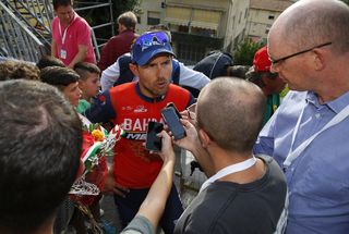 Sonny Colbrelli talks with reporters after Coppa Sabatini