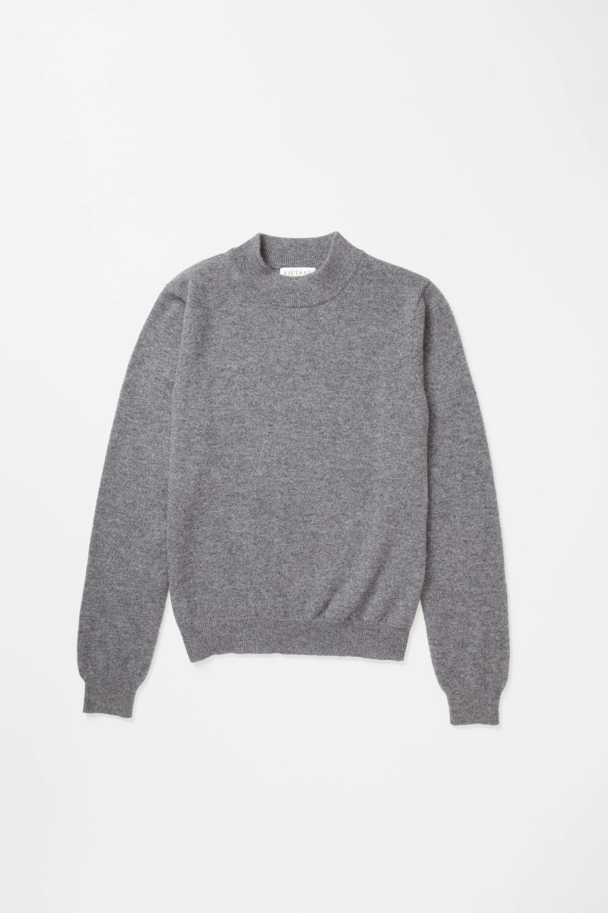 A grey cashmere jumper