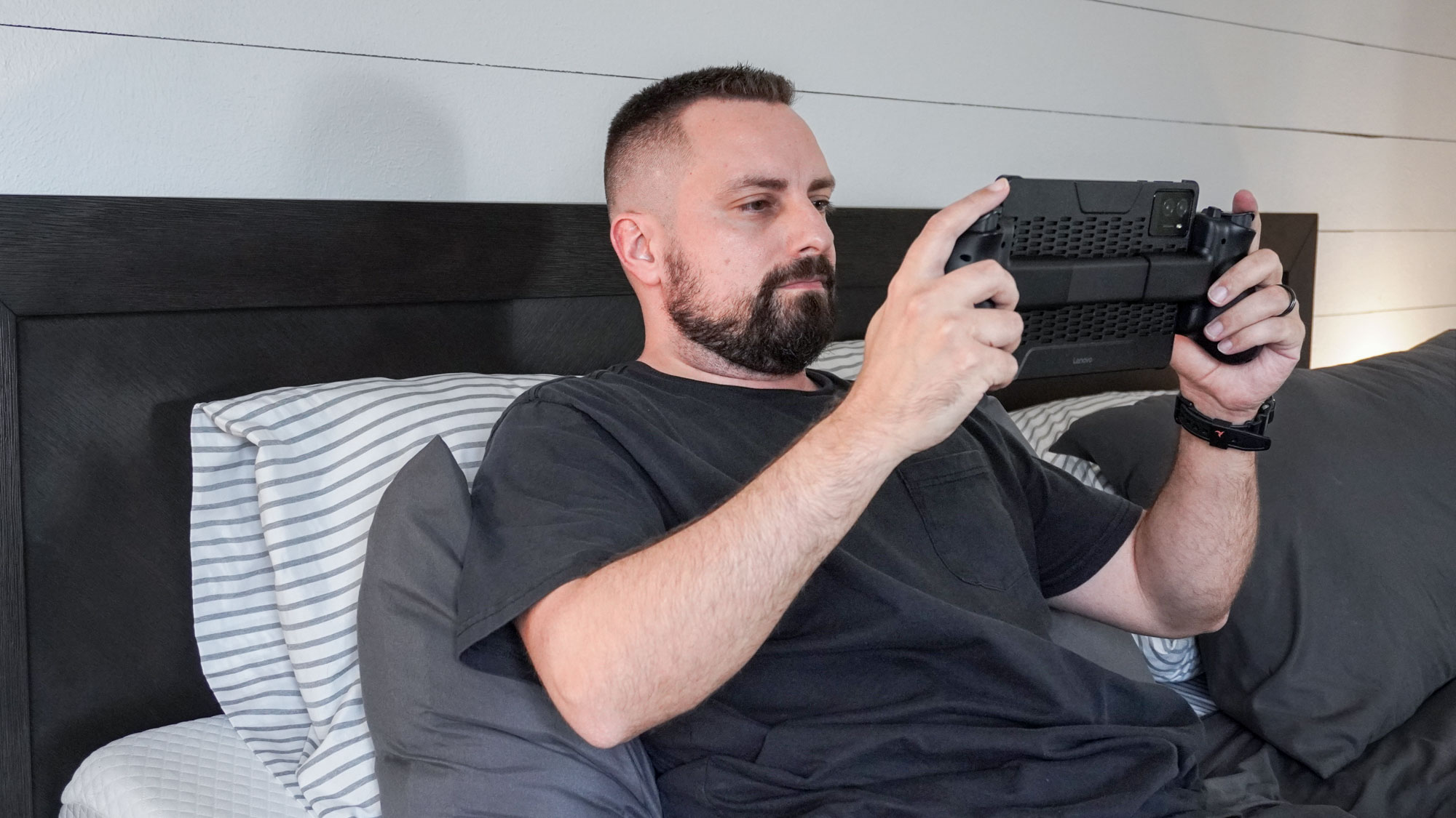 Playing games remotely in bed with a tablet and the Razer Kishi Ultra mobile game controller