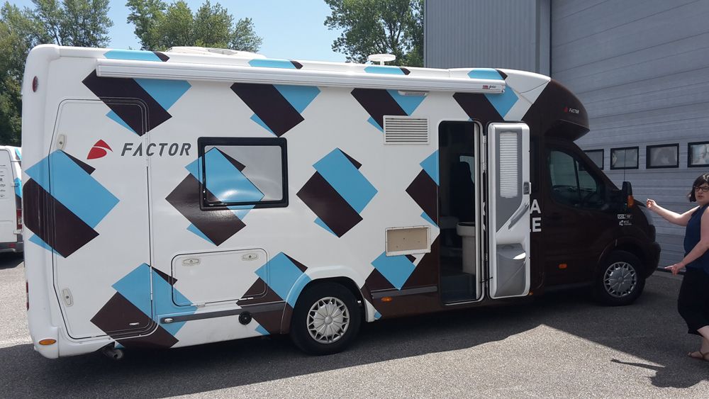 A team camper parked outside