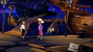 Secret of Monkey Island protagonist Guybrush Threepwood speaking to a pirate against a backdrop of docked pirate ships. A sign says "fuel economy"