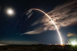 A long-exposure photo of a SpaceX Falcon 9 rocket launching the Hotbird 13F satellite for Eutelsat on Oct. 15, 2022.