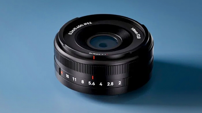7Artisans AF 18mm f/2 lens on a blue surface