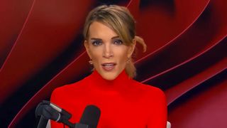 Megyn Kelly dressed in a turtleneck red shirt and haired pulled back in a recent episode of The Megyn Kelly Show.