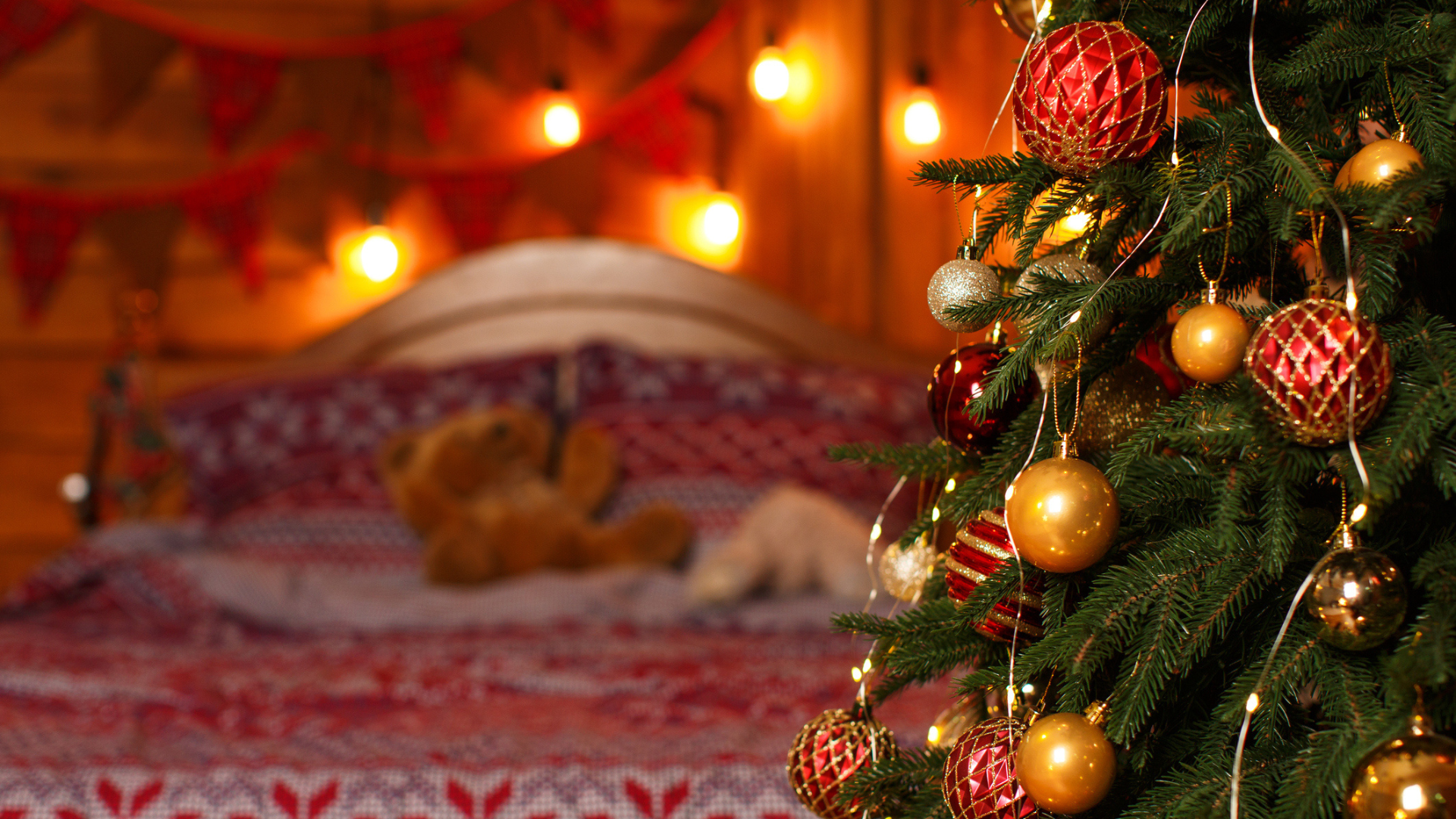 Christmas decorations and a tree in bedroom