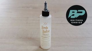 A bottle of Peaty’s Link Lube Premium All Weather lube