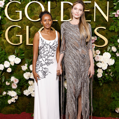 Zahara Jolie and Angelina Jolie attend the 2025 Golden Globe Awards at The Beverly Hilton on January 05, 2025 in Beverly Hills, California.