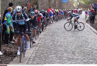 Tom Boonen leads up the Taaienberg as one of his teammates tries to make it back into the bunch