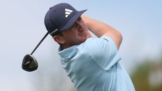 Nick Dunlap takes a tee shot at the BMW Championship