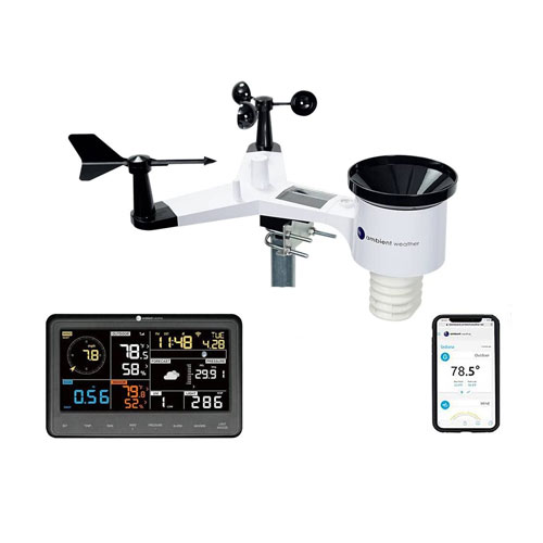 Ambient WS-2902 weather station with home display unit and phone on a white background.