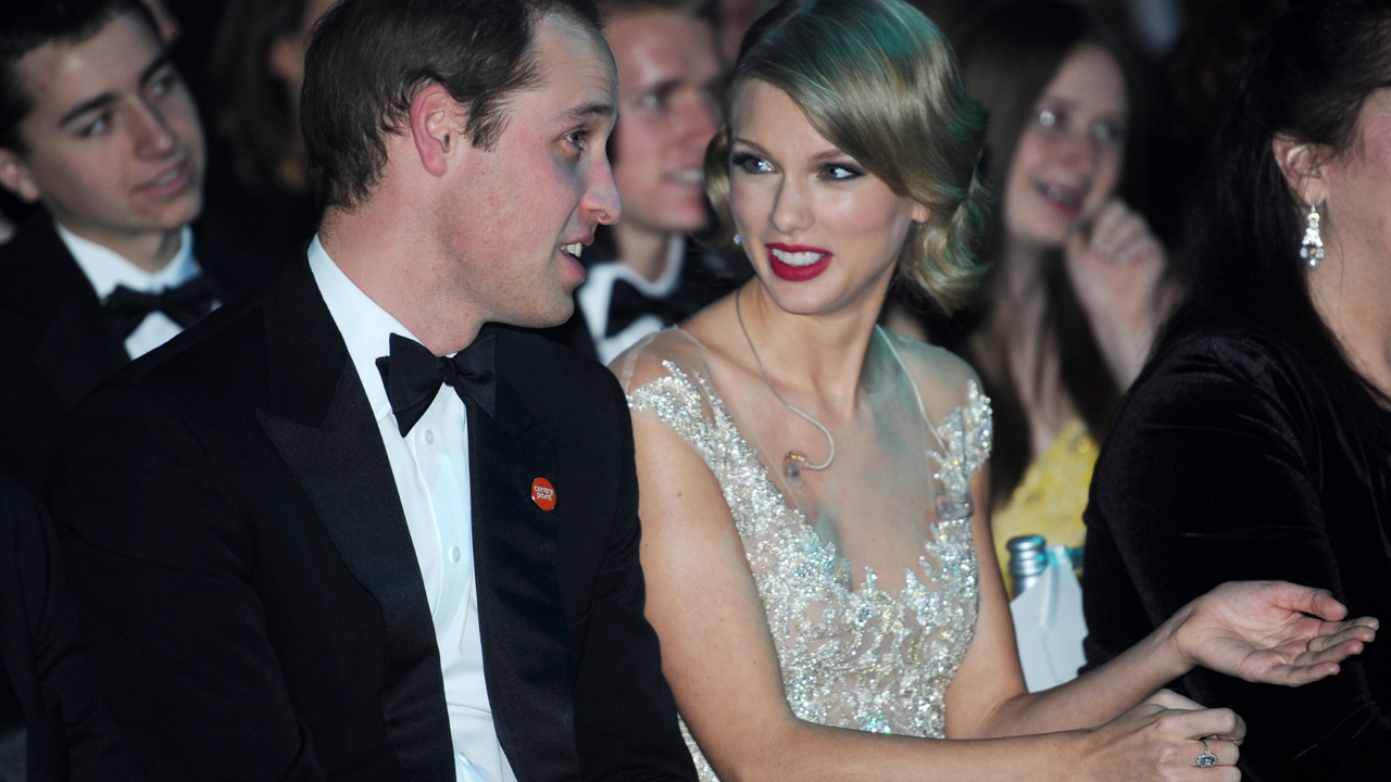 Prince William, Duke of Cambridge and Taylor Swift attend the Winter Whites Gala In Aid Of Centrepoint on November 26, 2013 in London, England.