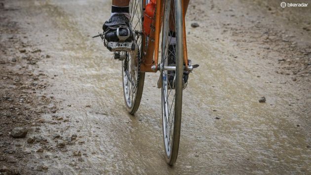 Rainy conditions turned the normally white and dusty strade bianche into brown and muddy