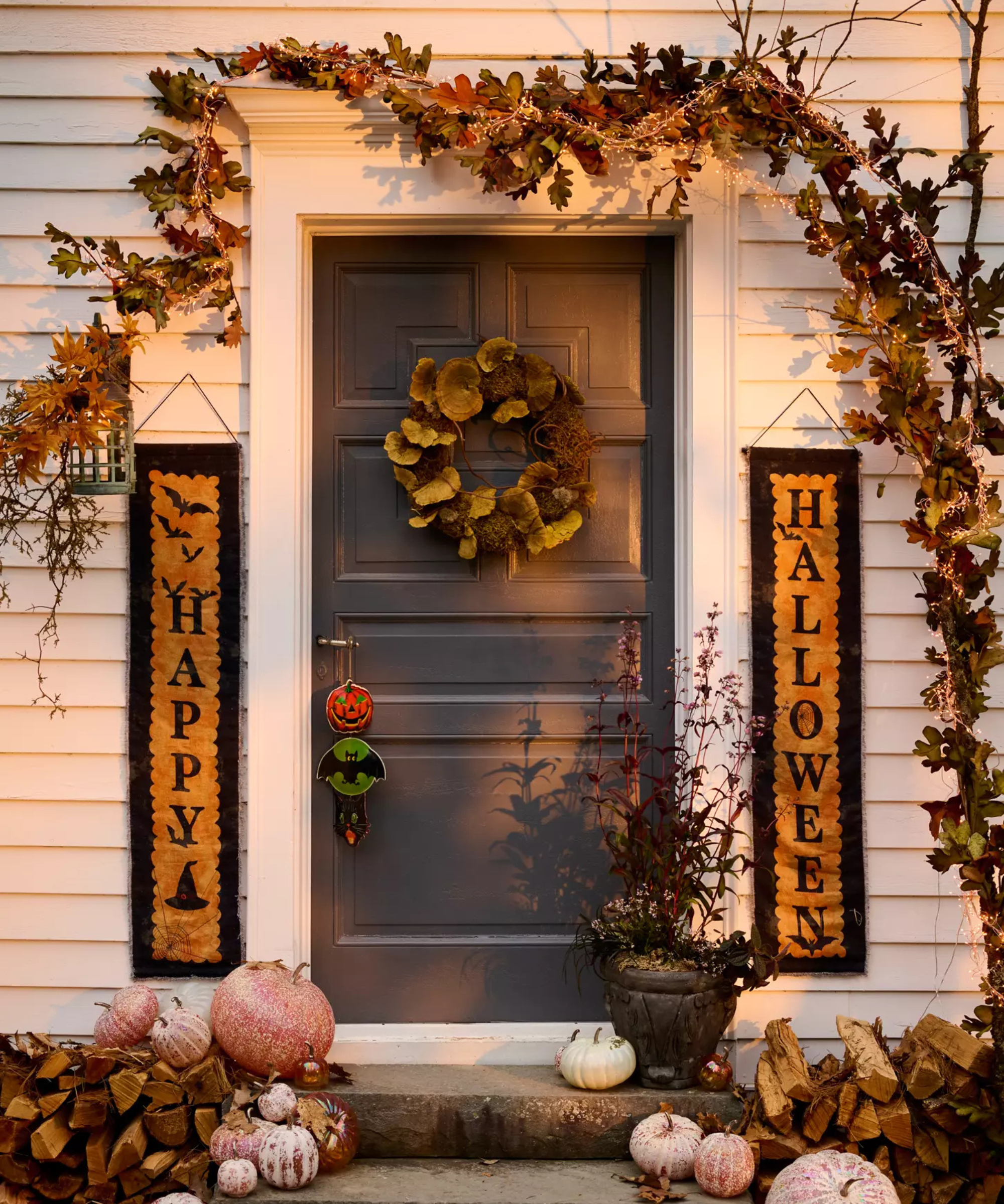 a front entrance decorated for Halloween