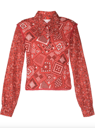 a bandana print shirt from ERL at Farfetch in front of a plain backdrop