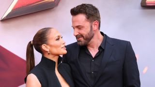 Lopez and Affleck smiling on the red carpet of The Flash 