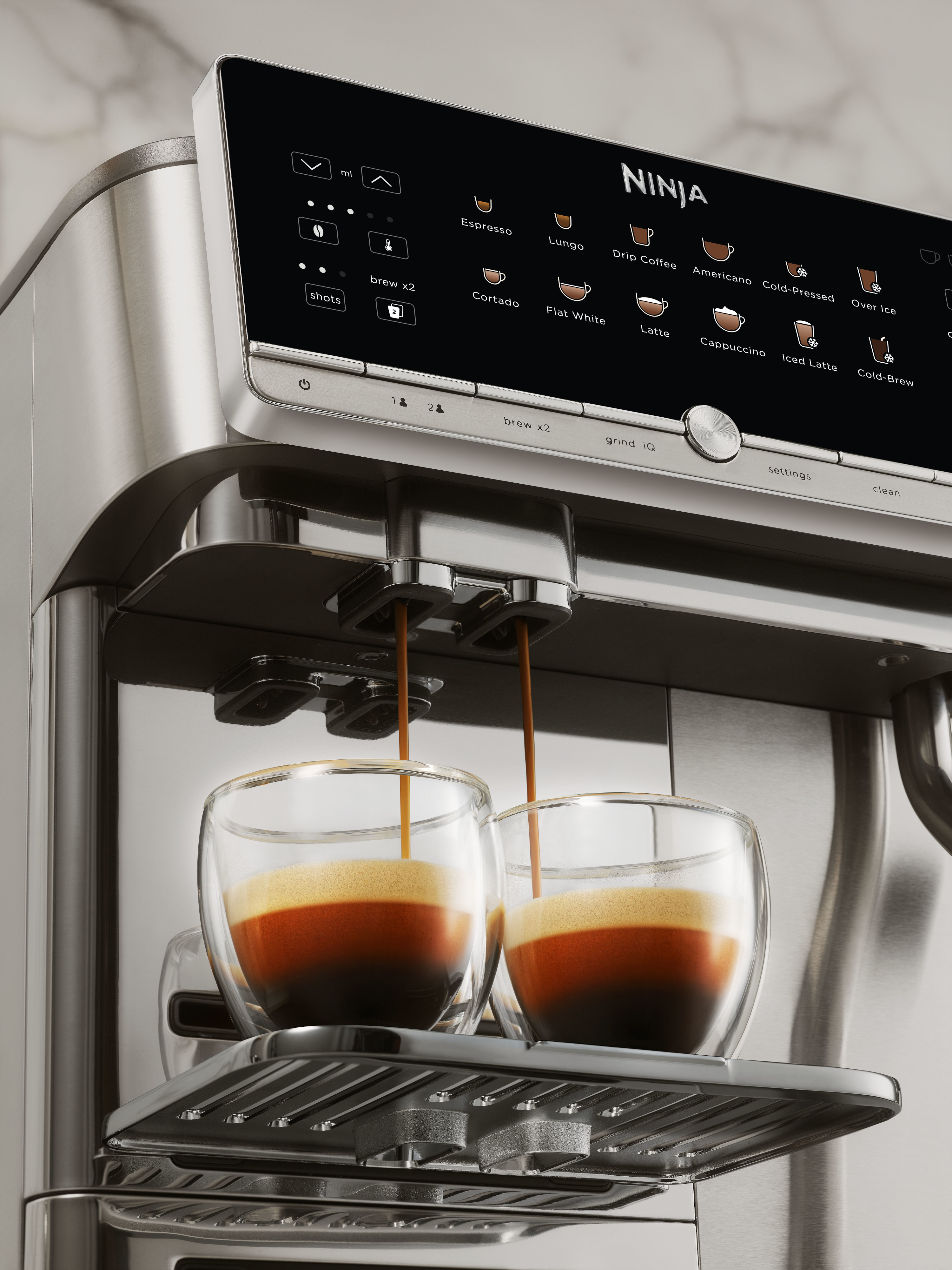 The AutoBarista Pro can produce two espressos at once