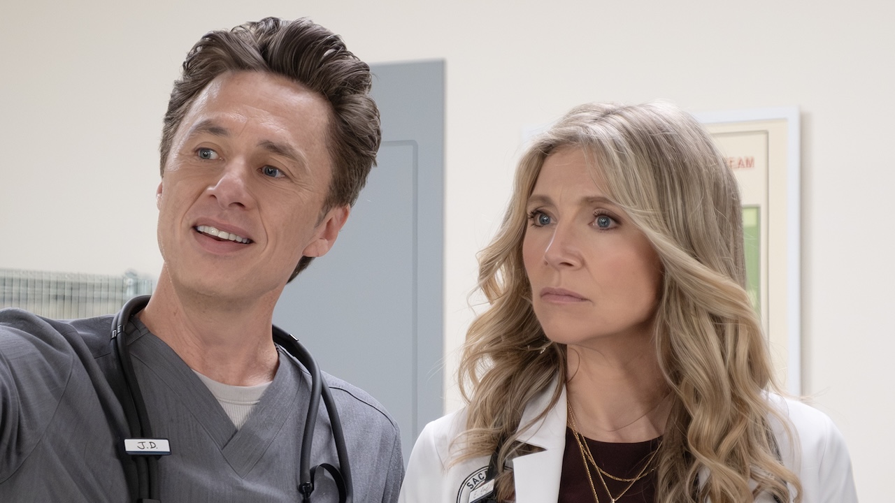 J.D. pointing out something to Elliott in Scrubs revival