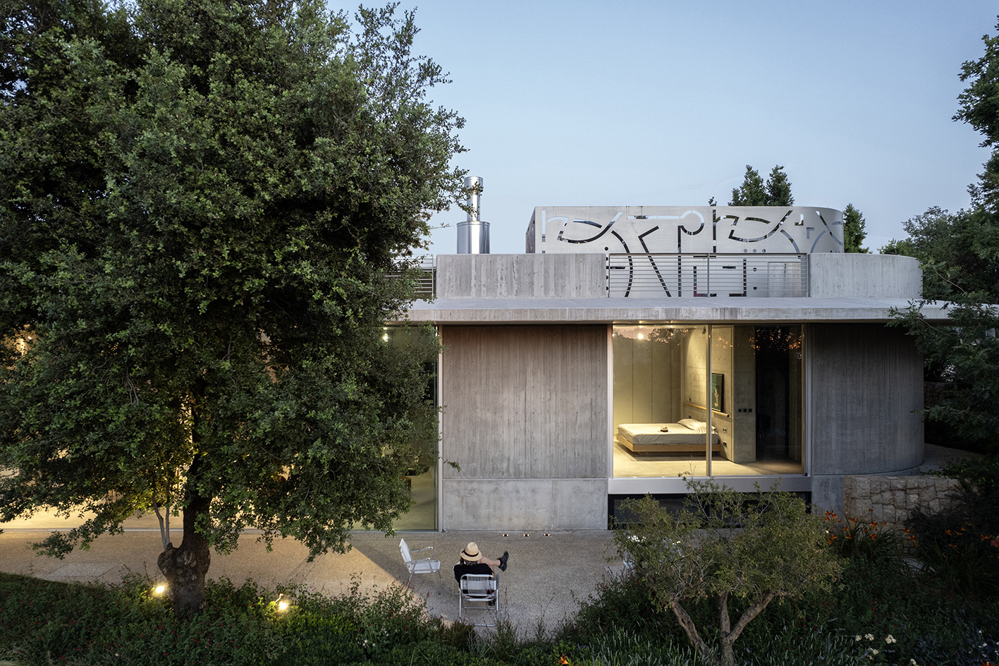 Capsule Retreat by East Architecture Studio, a concrete house in the leafy countryside with tall ceilings and minimalist interiors