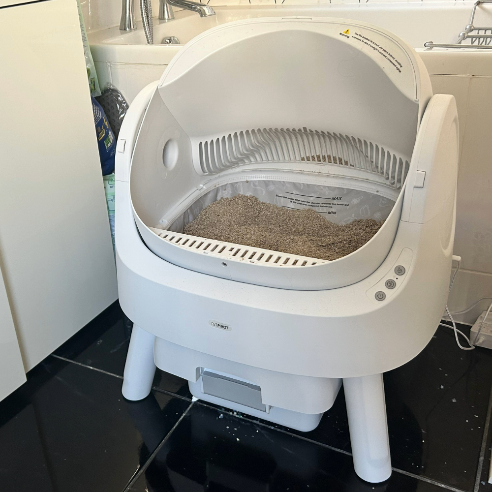 PetPivot Autoscooper 11 Open-top Self-cleaning Smart Cat Litter Box in Megan's bathroom