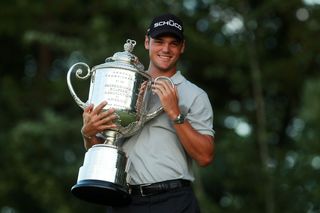 Martin Kaymer holds the PGA Championship trophy in 2010
