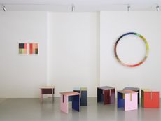 Tables made of colourful plywood sections intersected, made by Sophie Smallhorn for Uncommon projects