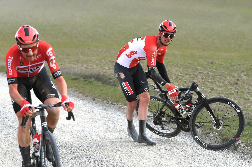 SIENA ITALY MARCH 05 Brent Van Moer of Belgium and Team Lotto Soudal being involved in a crash during the Eroica 16th Strade Bianche 2022 Mens Elite a 184km one day race from Siena to Siena Piazza del Campo 321m StradeBianche WorldTour on March 05 2022 in Siena Italy Photo by Tim de WaeleGetty Images
