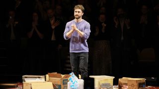 Daniel Radcliffe takes a bow onstage during curtain call at "Every Brilliant Thing" Opening Night at Hudson Theatre