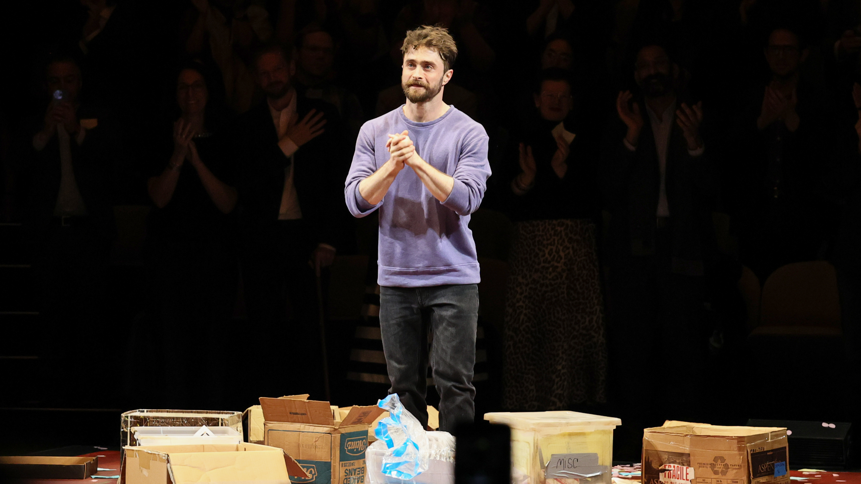  Daniel Radcliffe takes a bow onstage during curtain call at "Every Brilliant Thing" Opening Night at Hudson Theatre