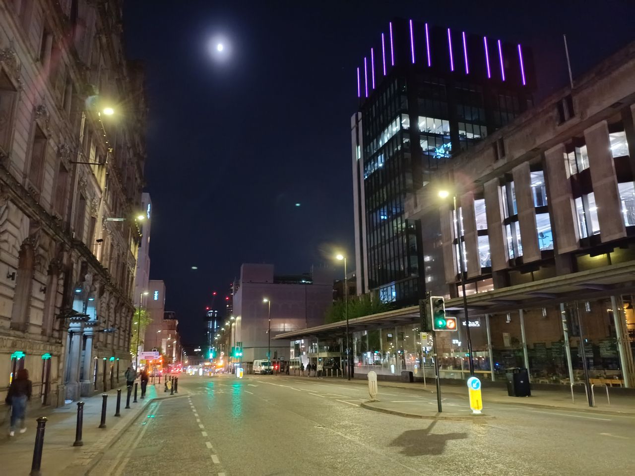 A street scene in Manchester city centre at night