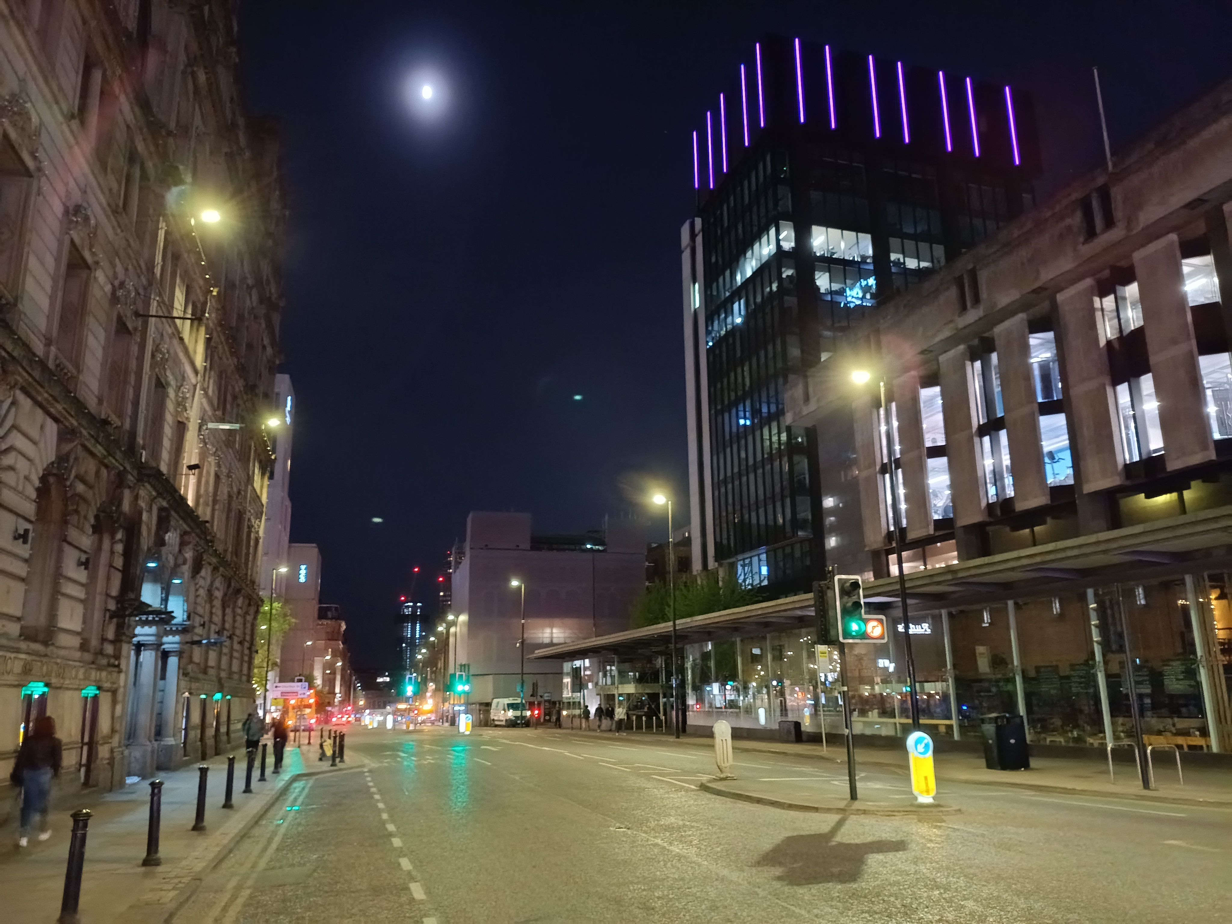A street scene in Manchester city centre at night