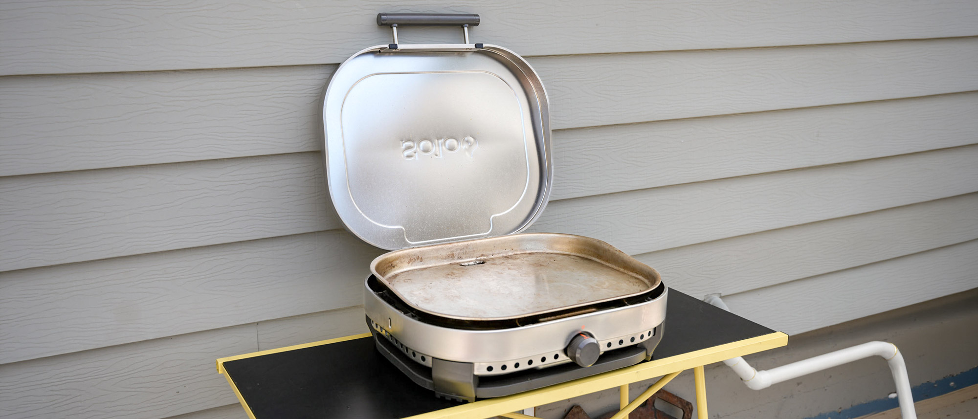 Solo Stove Steelfire 22 Griddle in a back yard