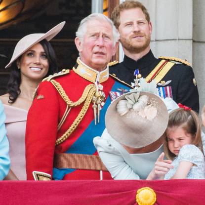 Meghan, Duchess of Sussex, Prince Charles, Prince of Wales, Prince Harry, Duke of Sussex, Catherine, Duchess of Cambridge, Princess Charlotte of Cambridge on the balcony of Buckingham Palace during Trooping The Colour 2018 on June 9, 2018 in London, England.