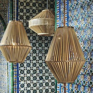 pendant lamps with blue designed wall
