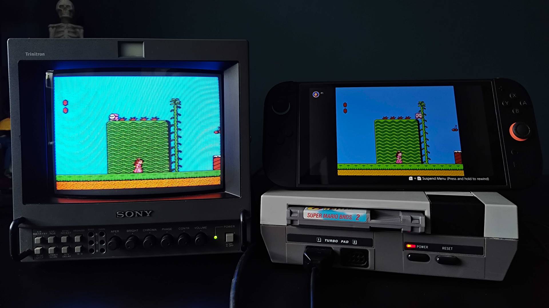 NASA NES clone console connected to Sony PVM CRT TV with Switch 2 on top and both showing Super Mario Bros 2 gameplay.