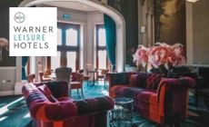 Warner Leisure Hotels logo placed over an image of a lounge room with checkered sofas