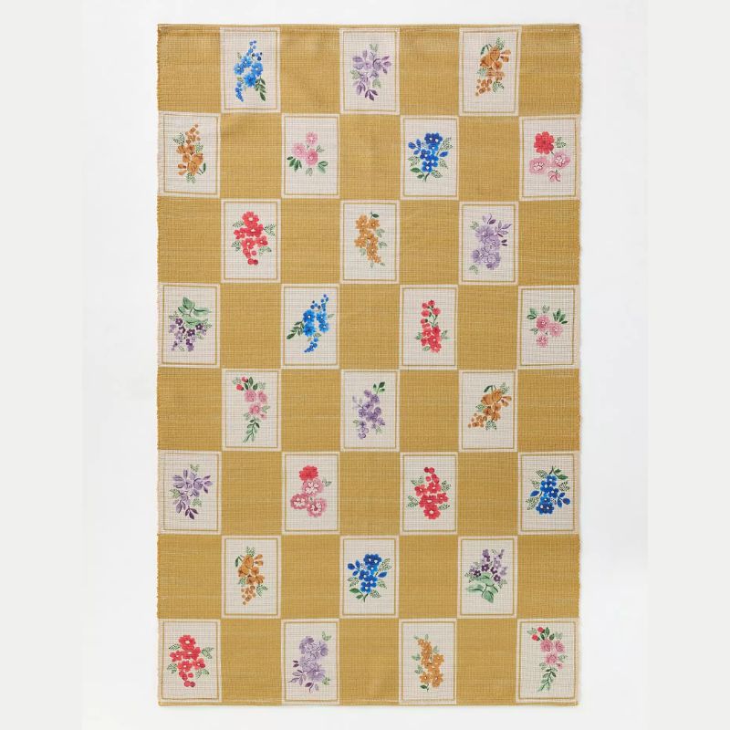 yellow patterned rug