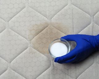 Mattress with stain using baking soda to clean