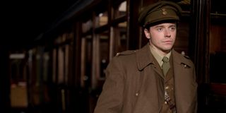 Jack Lowden boards a train in uniform in Benediction.