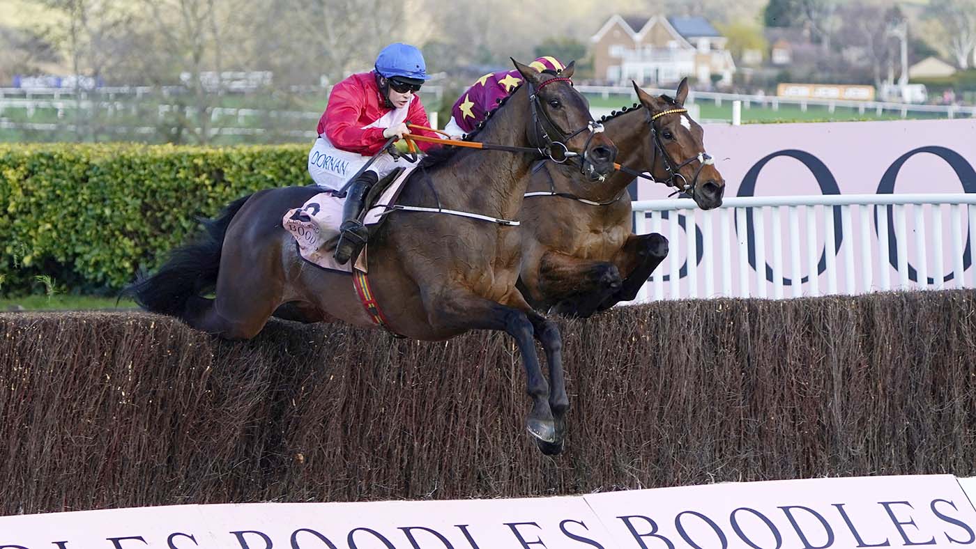 CHELTENHAM, ENGLAND - MARCH 18: Rachael Blackmore on A Plus Tard clear the last ahead of Robbie Power on Minella Indo to win The Boodles Cheltenham Gold Cup Chase race during day four of the Cheltenham Festival 2022 at Cheltenham Racecourse on March 18, 2022 in Cheltenham, England. (Photo by Alan Crowhurst/Getty Images)