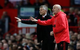 Mike Phelan (right) signed a new deal last week