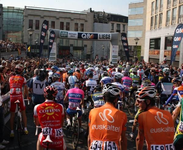 The riders wait for the race to roll out of Liege