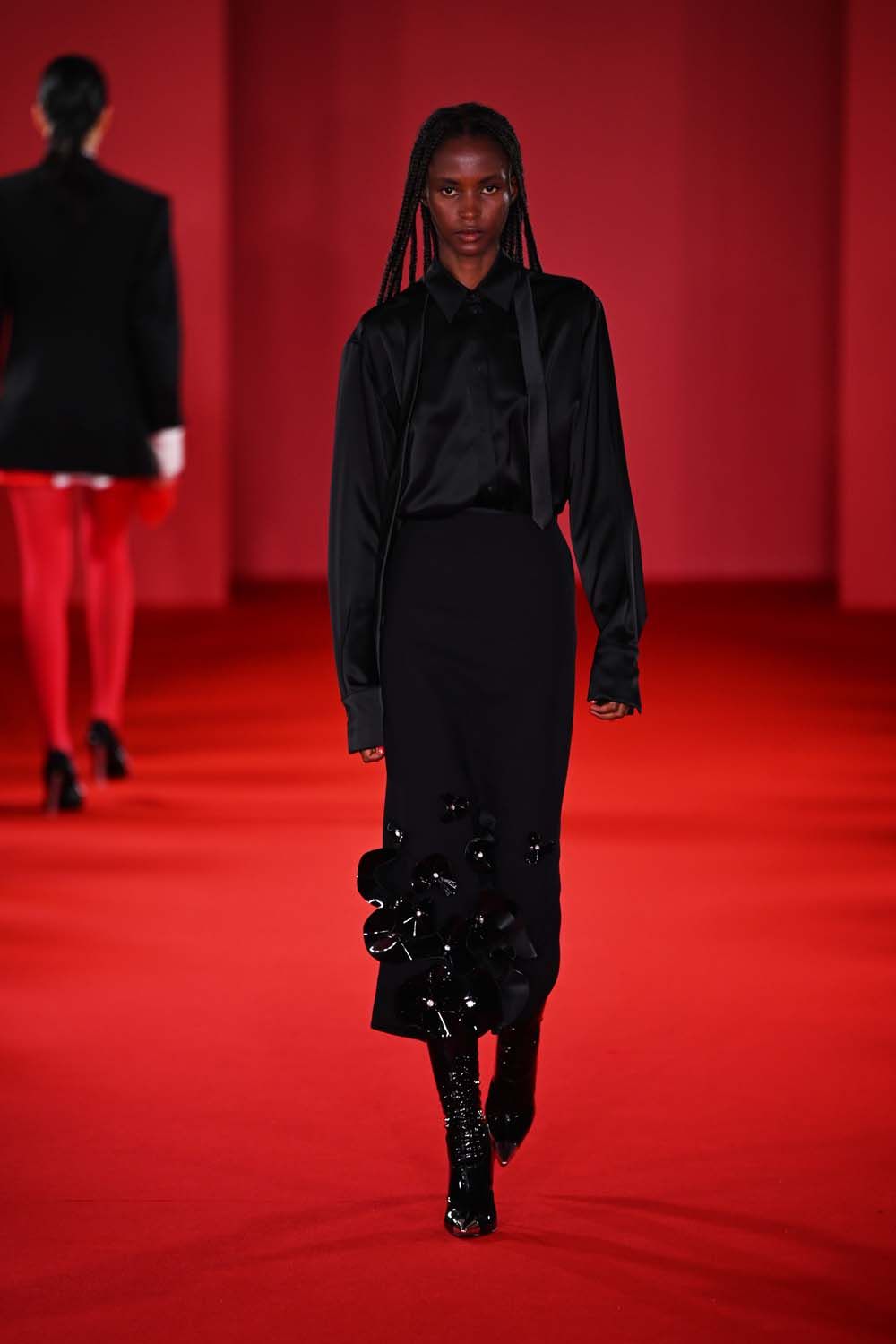 on the runway at London Fashion Week AW23