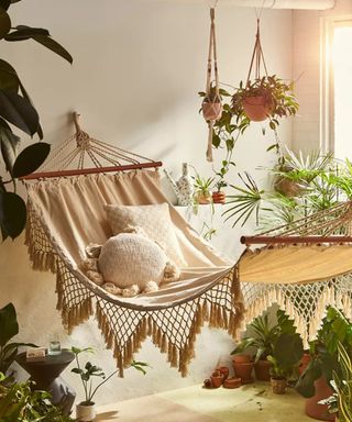 boho hammock in a outdoor patio - Urban Outfitters