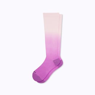 A pair of ombre pink and white knee socks