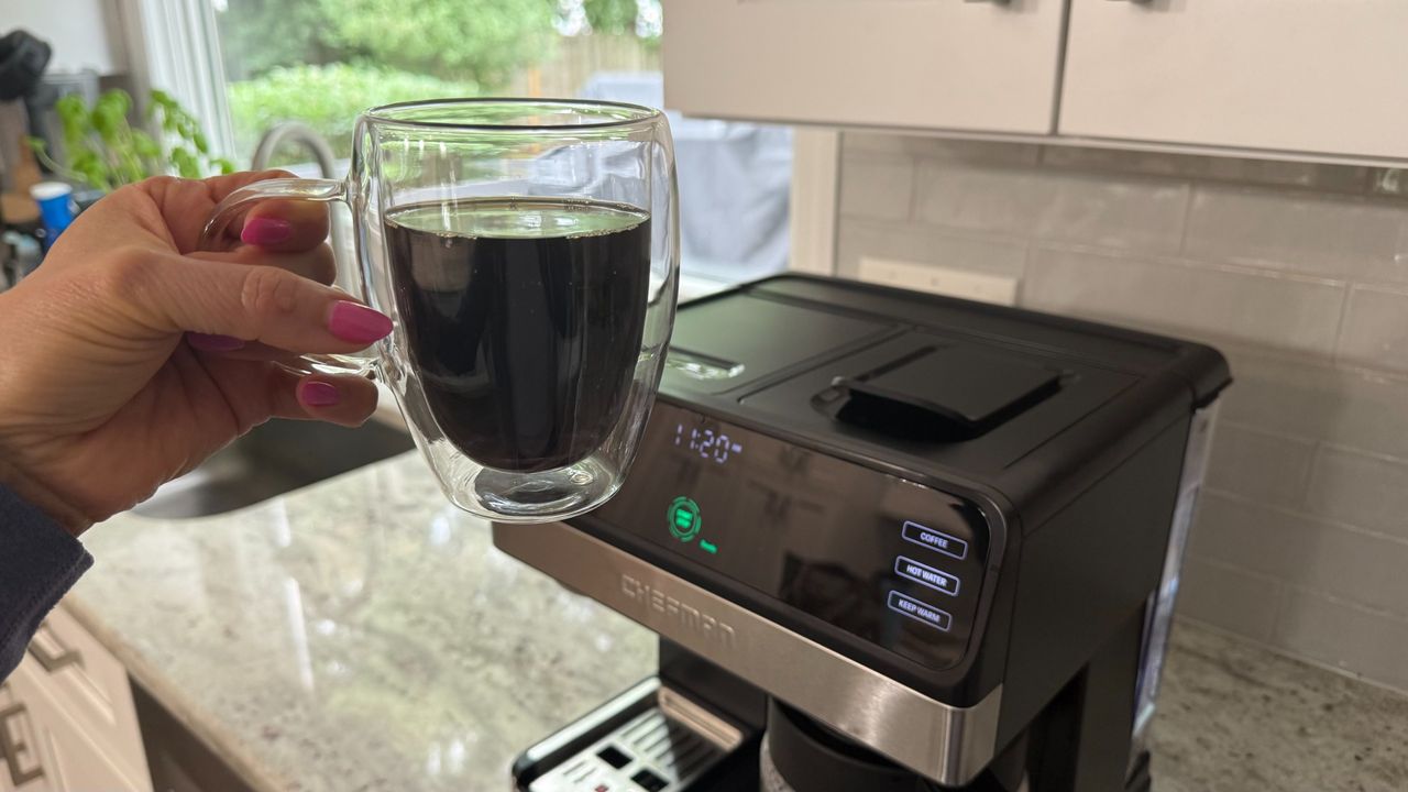 Chefman Coffee Station Pro brewing carafe of drip coffee