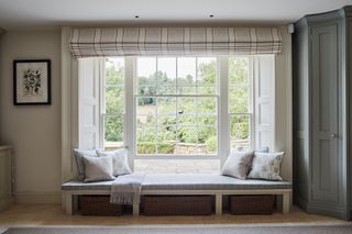window with bench seat below