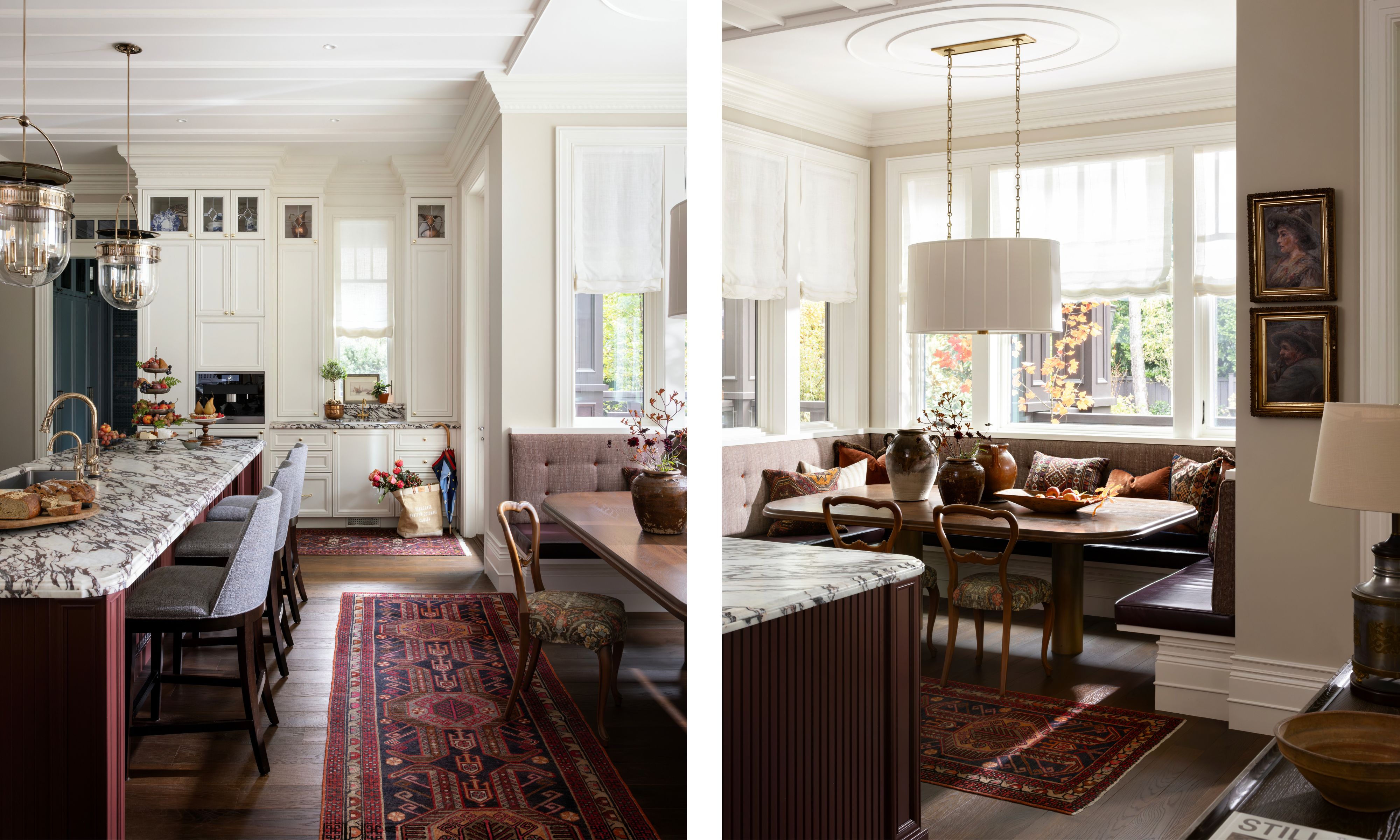 a white traditional kitchen with tall cabinetry, a statement marble countertop and splashback, a dark red island with marble and red vintage rugs