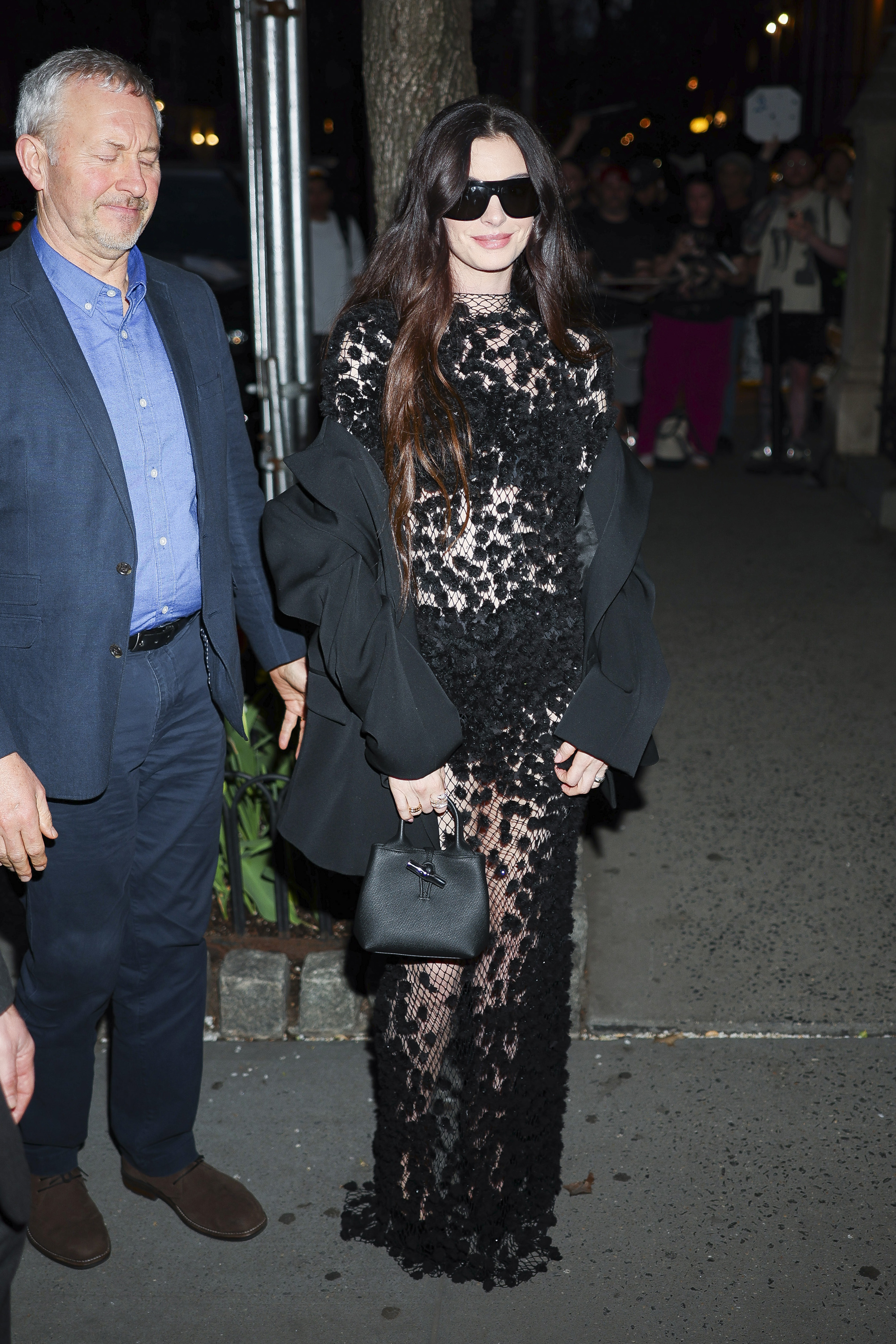 anne hathaway street style moments on press tour for devil wears prada